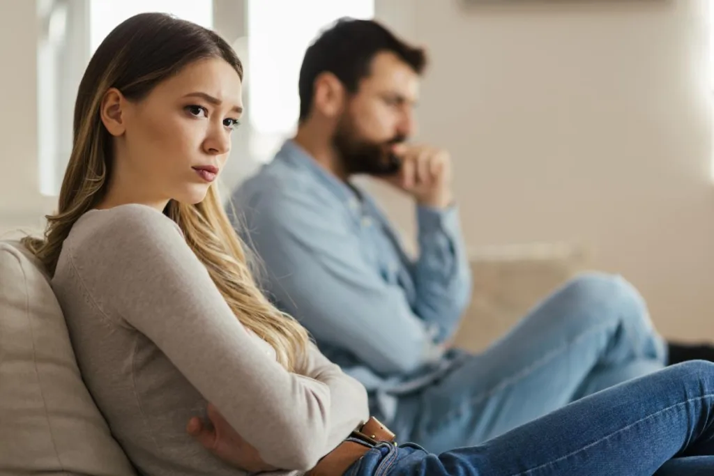 Two people pondering opiate addiction signs