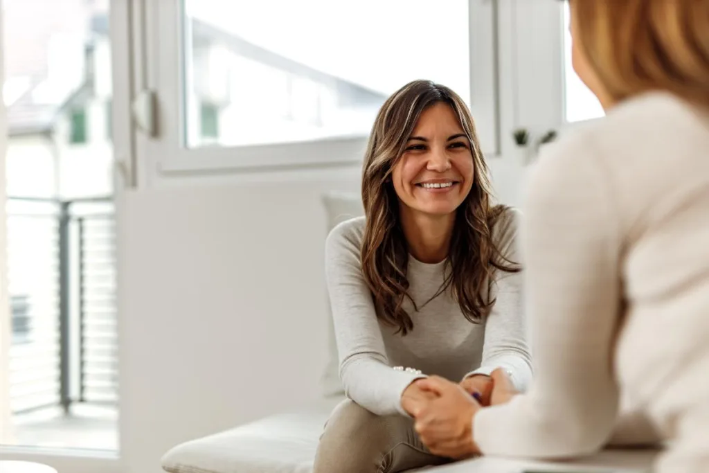 Two people considering a medication-assisted treatment program